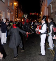 Penglaz with her Teazer accompanied by the Golowan Band at Montol 2007, Penzance Cornwall