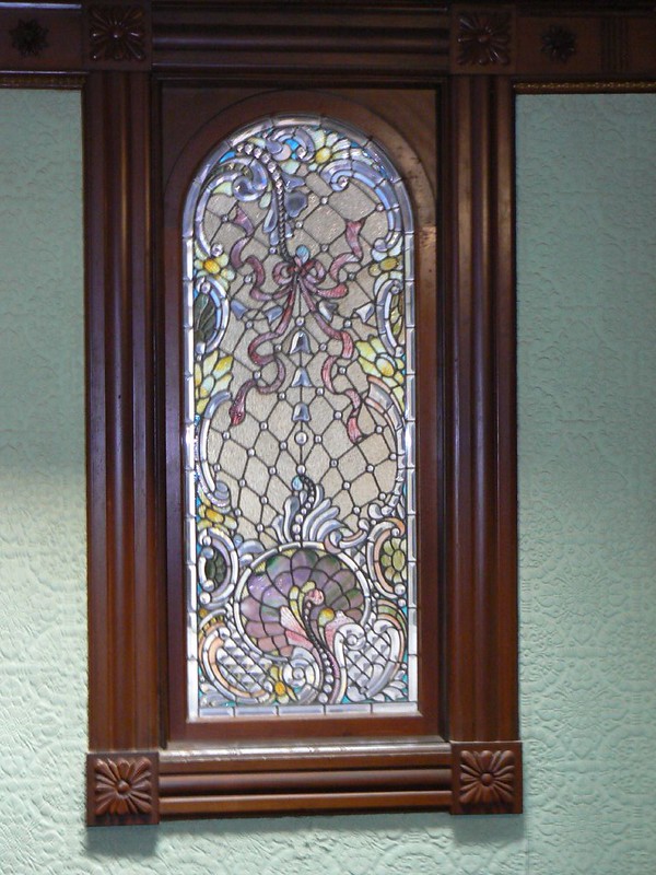 One designed by Tiffany himself so that when sunlight strikes the prismatic crystals a rainbow is cast across the room. The window was installed in an interior wall in a room with no light exposure, preventing the effect from being seen (Rick Lamoreaux)